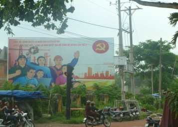 Vietnamese communist mural, utilising many symbols iconic to socialist countries.