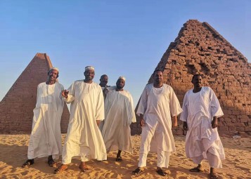 A group of Sudanese hanging out by Napata Sudan