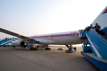 Boarding an Air Koryo flight