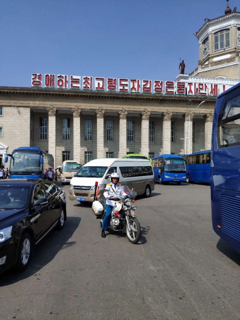 North Korean Cars Made In The DPRK 2023   Traffic Cop Pyongyang Station 768x1024 