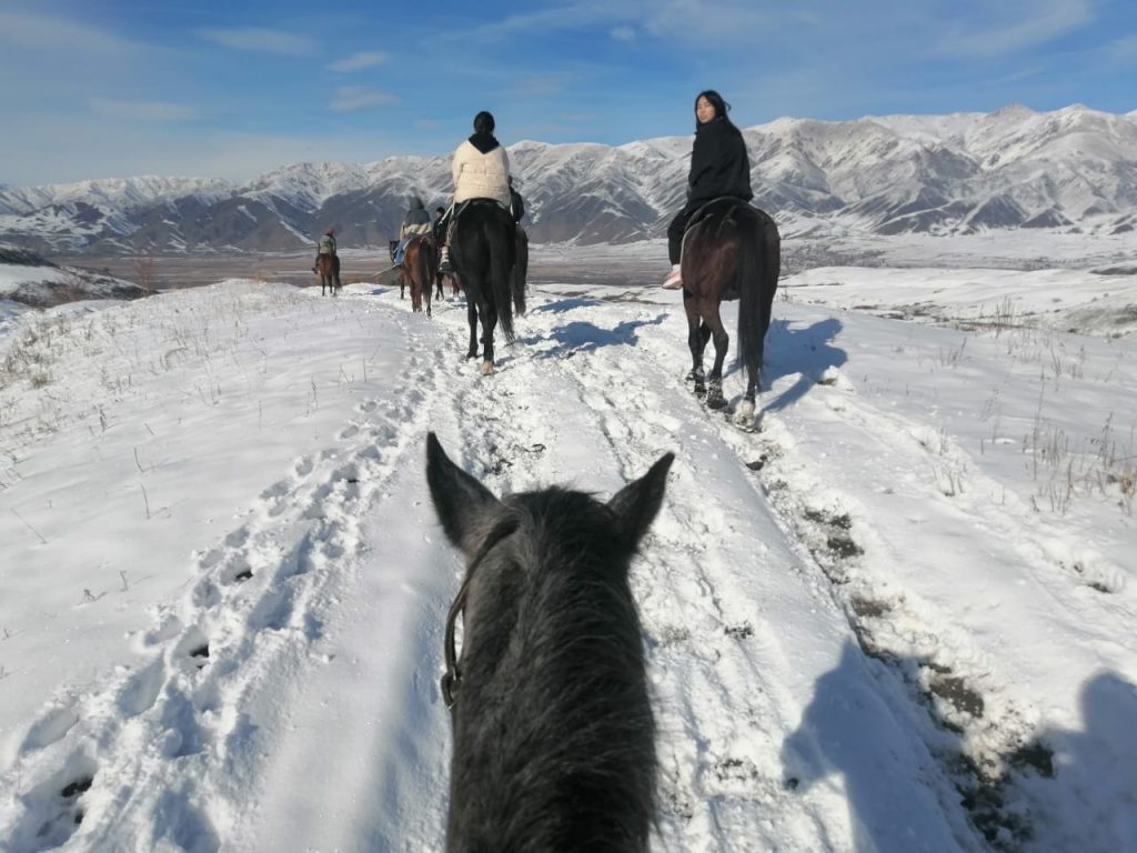 Kyrgyzstan Packing List - horse riding in the mountain