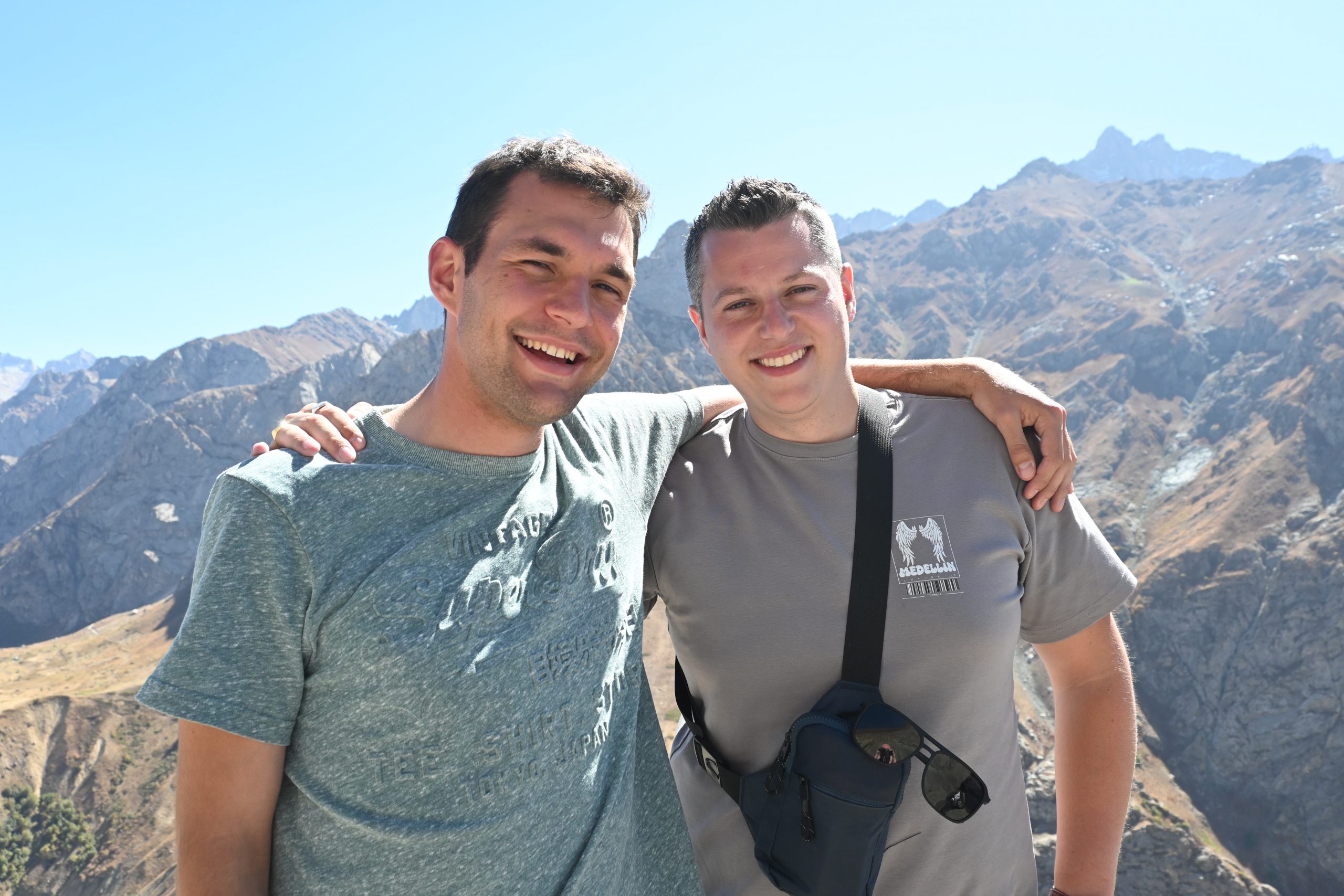 Pack for Tajikistan, happy tourists in the mountains