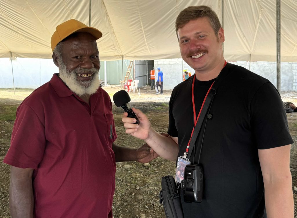 Host Justin Martell Interviews Local Guide Pious at the Mount Hagen Festival