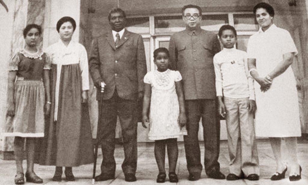 Monica (front and center) alongside her family and Kim Il-Sung and His Second Wife Kim Song-Ae, 1977